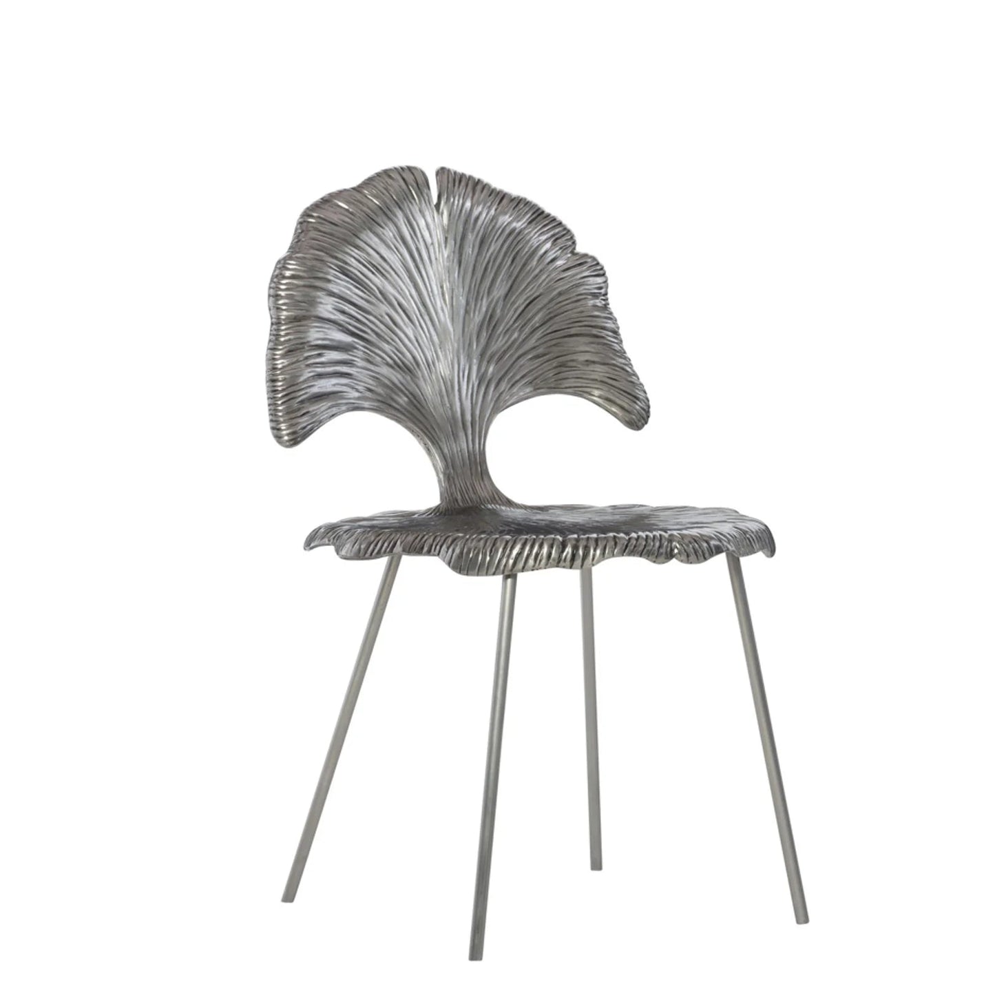 A modern sculptural side chair with a metallic silver seat and backrest featuring a textured, fan-like leaf design, supported by slim metal legs, shown against a plain white background.