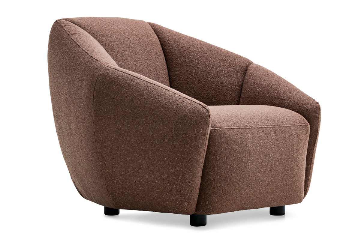 A modern barrel-style armchair upholstered in textured brown fabric, shown from a three-quarter angle on a plain white background.