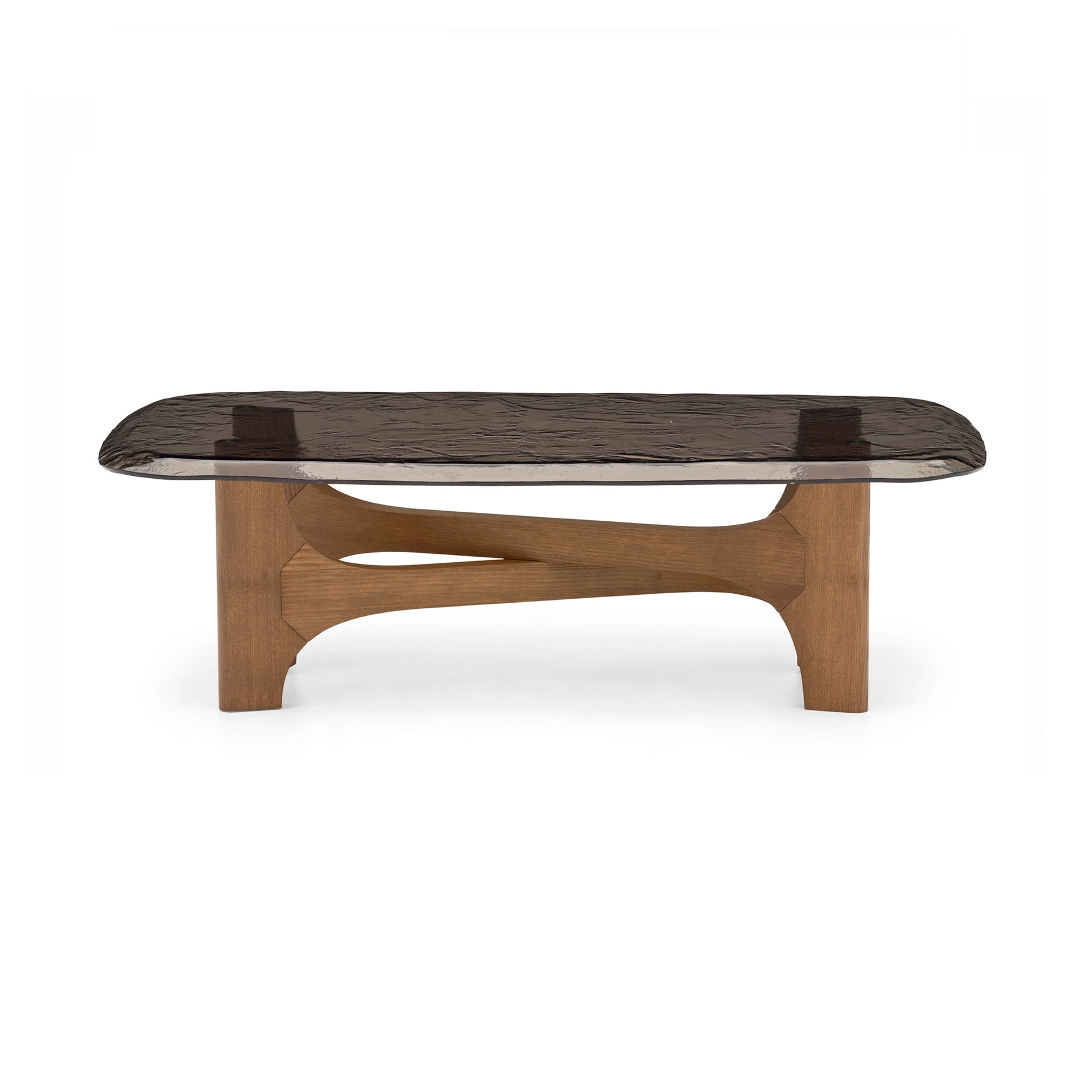 A modern coffee table with a dark textured glass top and a sculptural wooden base, shown against a plain white background.